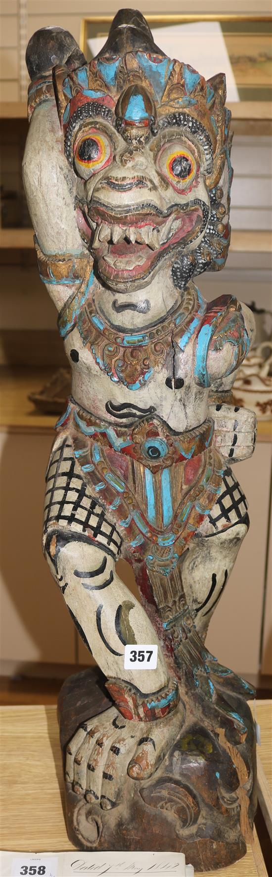 A Thai carved temple figure H.80cm